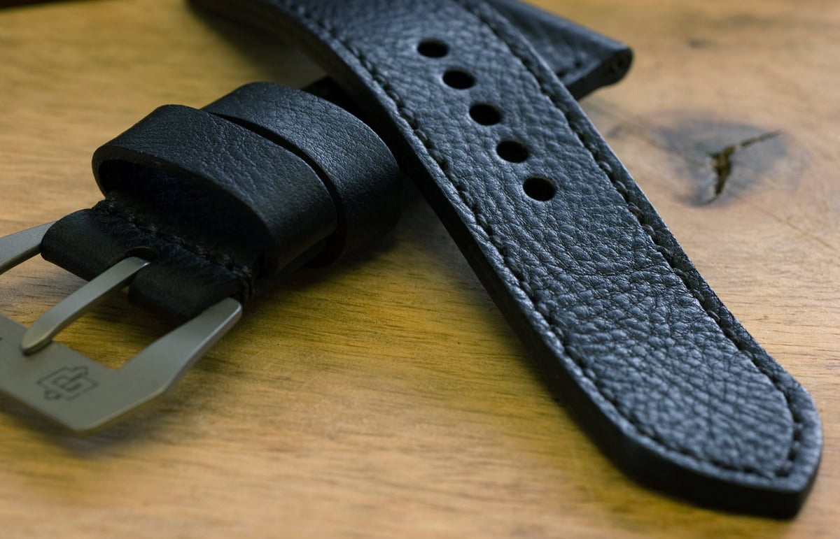 Raven leather - stitched with black linen thread. IMO this is the perfect black leather watch strap