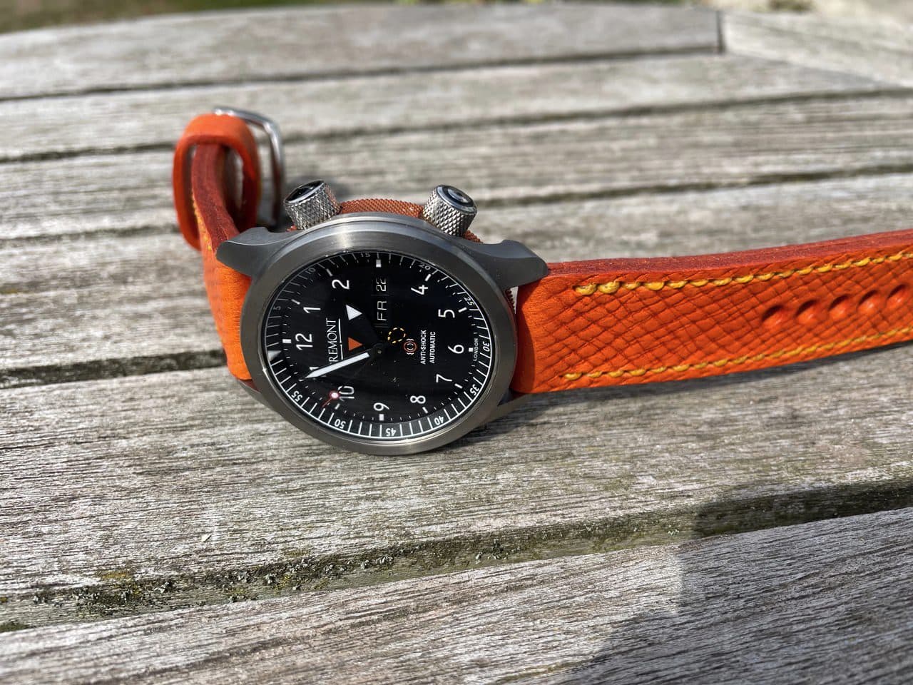 Bremont Martin baker II on Orange Crush leather with bright yellow stitching. © Bruce Hutchinson